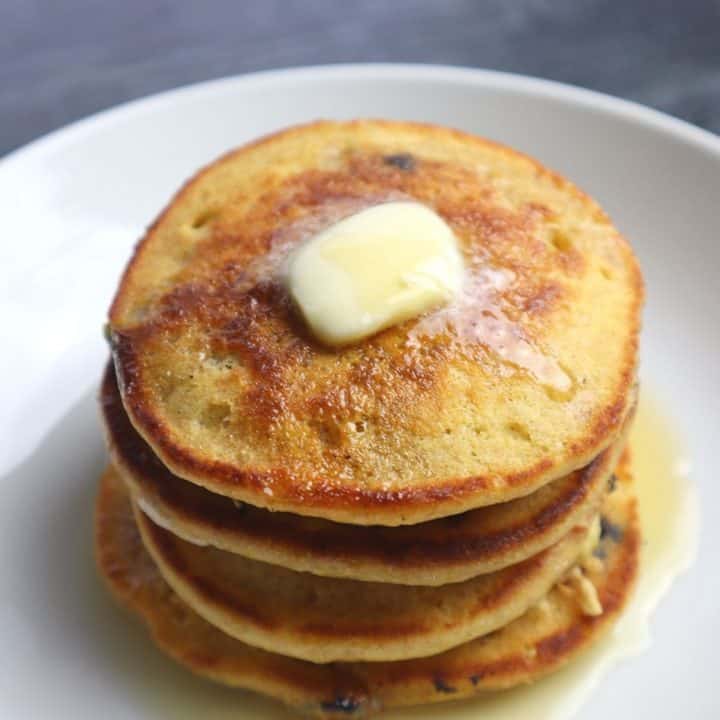 stack of pancakes with melting butter on top