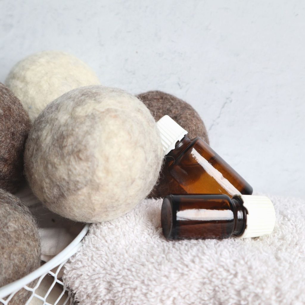 Essential oils and dryer balls for laundry